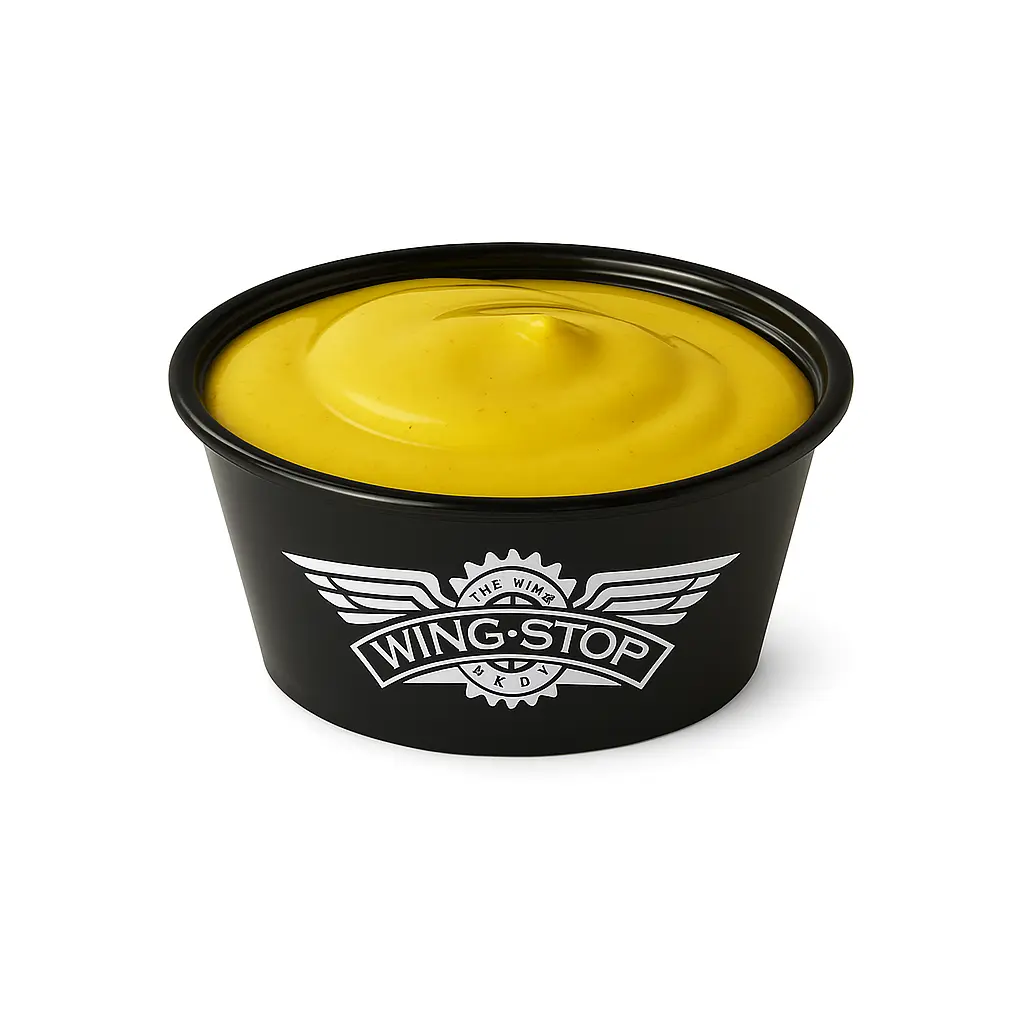 Cup of honey mustard sauce.